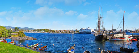 Panorama of the Bygdoy harbor with moored sail ship, yachts and small boats, Oslo, Norway