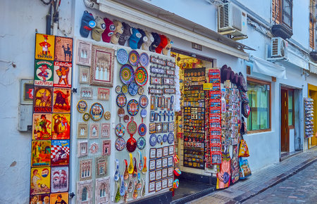 CORDOBA, SPAIN - SEPTEMBER 30, 2019: The maze of old town streets attracts people with many souvenir stores and art galleries, offering Andalusian style handicrafts, on September 30 in Cordobaのeditorial素材