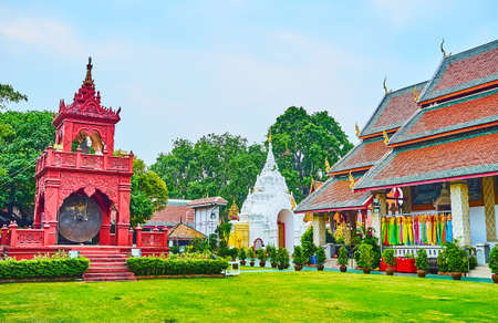 The gong in the scenic building of Ho Rakang bell tower, decorated with moulding, Wat Phra That...