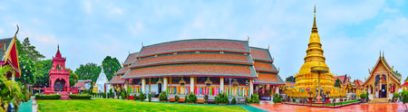 LAMPHUN, THAILAND - MAY 8, 2019: Panorama of Wat Phra That Hariphunchai Temple with Viharn (hall) Phra Chao Lawo, Phra Maha That gilt Chedi, large Viharn Luang and Ho Trai library, on May 8 in Lamphunのeditorial素材