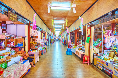 LAMPHUN, THAILAND - MAY 8, 2019: Interior of Kua Mung Tha Sing handicraft market, located in covered Tha Sing bridge over Kuang river, on May 8 in Lamphunのeditorial素材