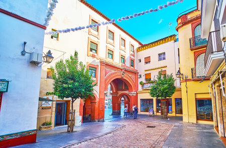 CORDOBA, SPAIN - SEP 30, 2019: The terracota gate leads to historic Plaza de la Corredera square, on Sep 30 in Cordobaのeditorial素材