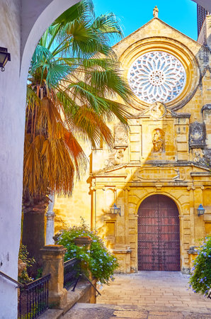 The stone facade of San Pablo Church, decorated with sculptures and scenic rosette window, Cordoba, Spainのeditorial素材