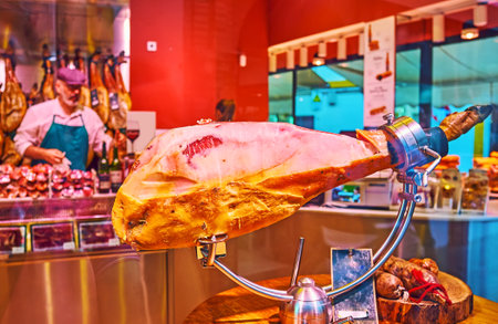 Interior of traditional Iberian products store with Jamon Iberico (dry-cured Spanish ham) leg, presenting in the showcase, Cordoba, Spainのeditorial素材
