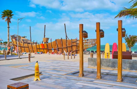 The scenic installation of the wooden ship on the shore of La Mer public beach, Dubai, UAEの写真素材
