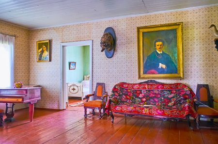 PEREIASLAV, UKRAINE - MAY 22, 2021: Interior of reception room of Prince Gorchakov's hunting lodge, Pereiaslav Scansen, on May 22 in Pereiaslavのeditorial素材