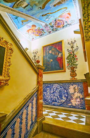 GRANADA, SPAIN - SEPT 27, 2019: The corridor with stairs, located behind the main altar and connecting Sacristy with Camarin chapel, Basilica of  San Juan de Dios, on Sept 27 in Granadaのeditorial素材
