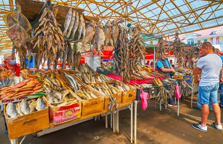 ODESSA, UKRAINE - June 18, 2021: The stalls with dried salted and smoked fish of different species in Pryvoz Market, on June 18 in Odessaのeditorial素材