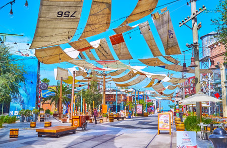 DUBAI, UAE - MARCH 4, 2020: The interesting design of La Mer Beachside shopping and dining district with many metal constructions and sails-like awning, on March 4 in Dubaiのeditorial素材