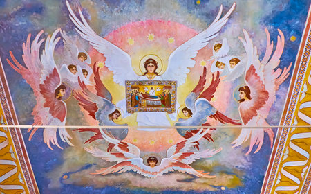 KYIV, UKRAINE - AUGUST 14, 2021: The colorful frescoes on ceiling of Refectory of Kyiv Pechersk Lavra Monastery, depicting Angel, holding an icon of Dormition of Virgin Mary, on Aug 14 in Kyivのeditorial素材
