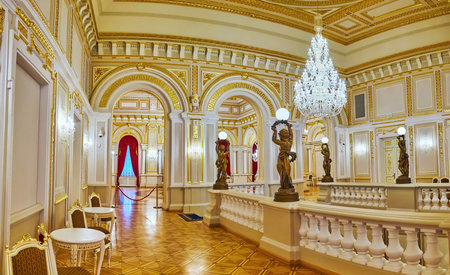 KYIV, UKRAINE - JUNE 25, 2021: The Main Staircase Hall of Mariinskyi Palace boasts spectacular decorations, sculptures, chandeliers and mosaic parquet, on June25 in Kyivのeditorial素材