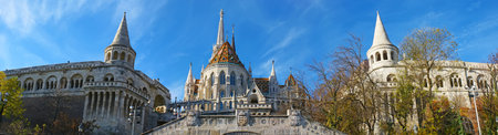 Panorama of the medieval Fisherman's Bastion, decorated with stone towers, carvings and coats of...
