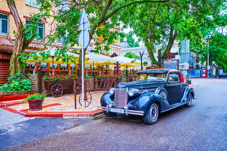 ODESSA, UKRAINE - June 19, 2021: The beautiful black vintage Chevrolet porket at Georgian restaurant in historical center of the city, on June 19 in Odessaのeditorial素材