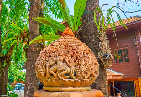 CHIANG MAI, THAILAND - MAY 4, 2019: The scenic lotus bud shaped sculpture with Hindu deity figure in garden of Baan Phor Liang Meun Terracotta Arts Hotel, on May 4 in Chiang Maiのeditorial素材