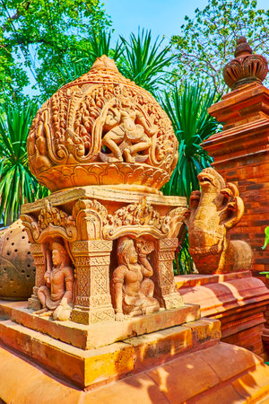 CHIANG MAI, THAILAND - MAY 4, 2019: The ornate terracotta sculptures of Hindu deitis, Naga serpent, lotus flower bud in garden of Baan Phor Liang Meun Terracotta Arts Hotel, on May 4 in Chiang Maiのeditorial素材