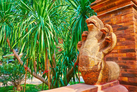 CHIANG MAI, THAILAND - MAY 4, 2019: The beautiful terracotta sculpture of five-headed Naga serpent in garden of Baan Phor Liang Meun Terracotta Arts Hotel, on May 4 in Chiang Maiのeditorial素材