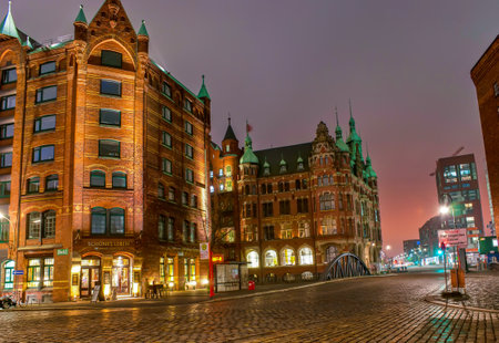 HAMBURG, GERMANY - NOVEMBER 20, 2012: The night scene in Speicherstadt district among scenic restored historical warehouses, on Nov 20 in Hamburgのeditorial素材