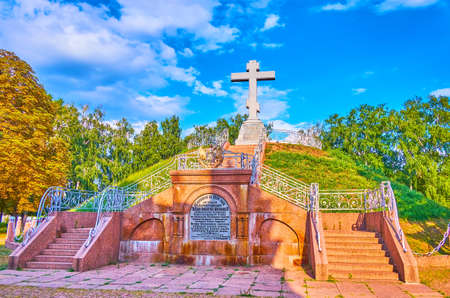 Th common grave of Russian warriors fallen in Poltava Battle and the cross on the top, Ukraine