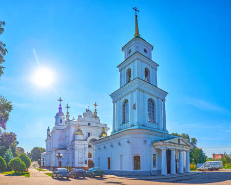 The view on Holy Dormition Cathedral of Poltava with high bell tower, located in Cathedral Park, Ukraineの写真素材