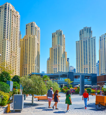 DUBAI, UAE - MARCH 7, 2020: The tall buildings of Dubai Marina are seen from the JBR Marina Beach Walk, on March 7 in Dubaiのeditorial素材