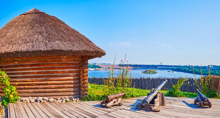 The reconstructed Cossack garrison grounds and old wooden fort with cannons in Zaporozhian Sich scansen, Ukraineの写真素材