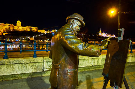 The statue of famous Hungarian painter Ignac Roskovics, located in Belgrade Quay, Pest district, Budapest, Hungaryのeditorial素材