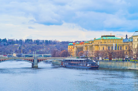 The view from Vltava River on the Rudolfinum, Manes Bridge and the Letna Hill in the background, Prague, Czech Republicのeditorial素材