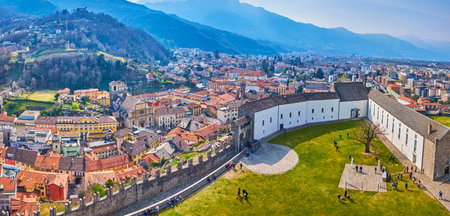 BELLINZONA, SWITZERLAND - MARCH 19, 2022: Panorama of Castelgrande fortress and surrounding Bellinzona city, on March 19 in Bellinzona, Switzerlandのeditorial素材