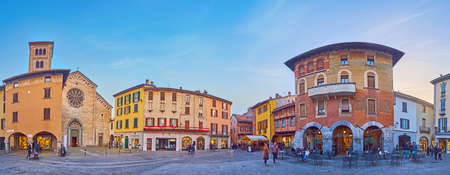 COMO, ITALY - MARCH 20, 2022: Evening panorama of Piazza del Mercato del Grano (Grain Market Square)...