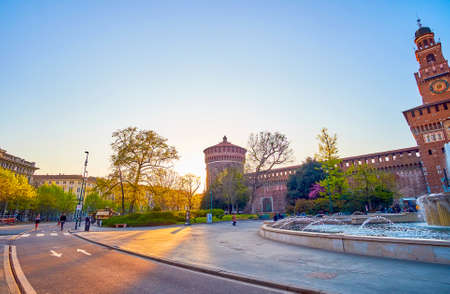 MILAN, ITALY - APRIL 5, 2022: The twilights over lare medieval Sforza Castle, on April 5 in Milan, Italyのeditorial素材