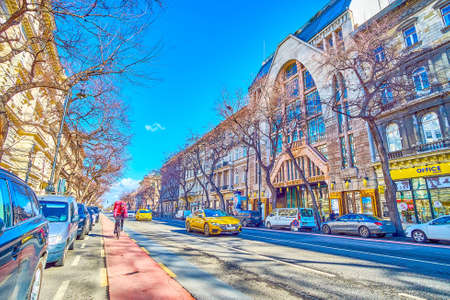 BUDAPEST, HUNGARY - FEBRUARY 23, 2022: Andrassy Avenue is one of the main thoroughfares of the city with numerous stores, restaurants and offices, on February 23 in Budapest, Hungaryのeditorial素材