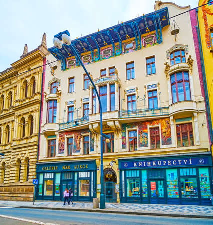 PRAGUE, CZECH REPUBLIC - MARCH 5, 2022: The ornate facade of Divadlo Viola Theatre with sculptures, cmurals and complex roof decoration, Narodni Avenue, on March 5 in Pragueのeditorial素材