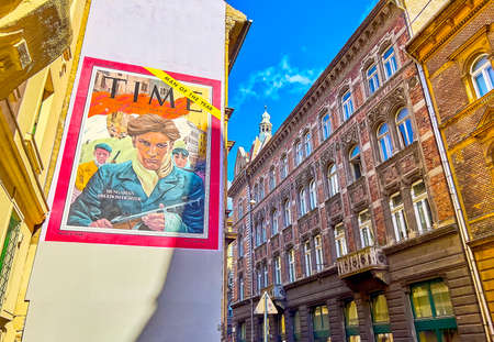 BUDAPEST, HUNGARY - FEBRUARY 23, 2022: The murals on the building's wall are one of the features of Jewish Quarter, on February 23 in Budapest, Hungaryのeditorial素材