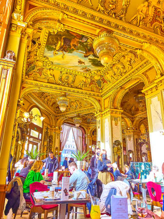 BUDAPEST, HUNGARY - FEBRUARY 23, 2022: Marvelous interior of famous New York Cafe that is one of must-visit place for all guests of the city, on February 23 in Budapest, Hungaryのeditorial素材