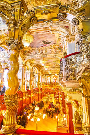 BUDAPEST, HUNGARY - FEBRUARY 23, 2022: Relax and enjoy wonderful dinner in New York Cafe, one of the most extraordinal cafe with classic design, on February 23 in Budapest, Hungaryのeditorial素材