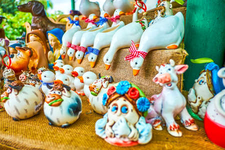 Colorful ceramic decorative toys in traditiona lUkrainian style on National Sorochynsky Fair in Sorochyntsi, Ukraineの写真素材