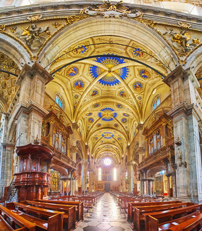 COMO, ITALY - MARCH 20, 2022: Santa Maria Assunta Cathedral boasts richly decorated interior with...