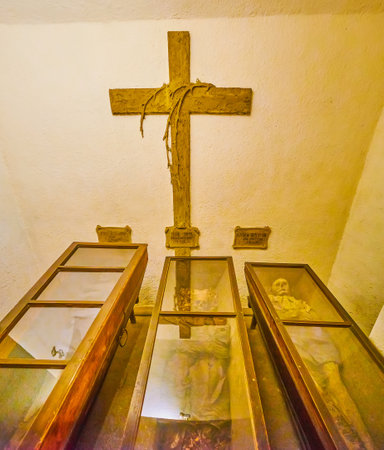 BRNO, CZECH REPUBLIC - MARCH 10, 2022: The deceased brothers of Capuchin orden mummified and lie in modest coffin in crypt of Capuchin Tomb, on March 10 in Brno, Czech Republicのeditorial素材