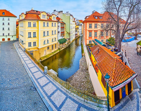 Panorama of Na Kampe Street, historic houses, small restaurant and Devil's (Certovka) Canal in Mala Strana (Lesser Quarter, Little Town), Prague, Czech Republicのeditorial素材