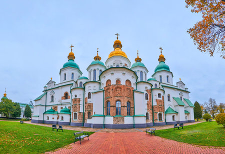 Panorama of the splendid Byzantine St Sophia Cathedral with elegant green and golden domes, preserved details of medieval apse, Kyiv, Ukraineのeditorial素材
