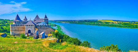 Panoramic view on Dniester river and the stunning medieval Khotyn Fortress on its bank, Ukraineのeditorial素材