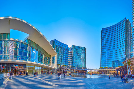 MILAN, ITALY - APRIL 9, 2022: Modern neighborhhod on Piazza Gae Aulenti, on April 9 in Milan, Italyのeditorial素材