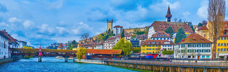 Panorama of Altstadt of Lucerne with Reuss river, historic houses and old wooden Spreuerbrucke, Switzerlandの写真素材