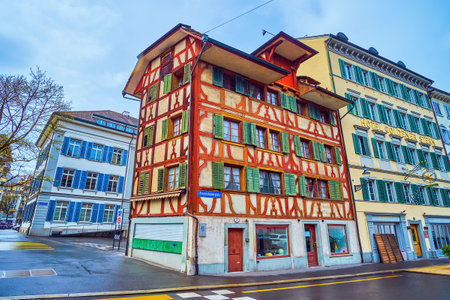 LUCERNE, SWITZERLAND - MARCH 30, 2022: Beautiful half-timbered houses in traditional style in Altstadt, on March 30 in Lucerne, Switzerlandの写真素材