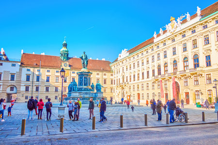 VIENNA, AUSTRIA - FEBRUARY 17, 2019: Inner Burgplatz square of Hofburg Palace with monument to Kaiser Franz I in the middle, on February 17 in Vienna, Austriaのeditorial素材