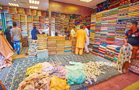 DUBAI, UAE - MARCH 6, 2020: Interior of textile stall of fabric market in Pakistan Pavilion of...