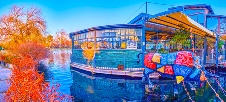 BUDAPEST, HUNGARY - MARCH 2, 2022: The sculpture of the bull at the lakefront restaurant in City Park, on March 2 in Budapestのeditorial素材