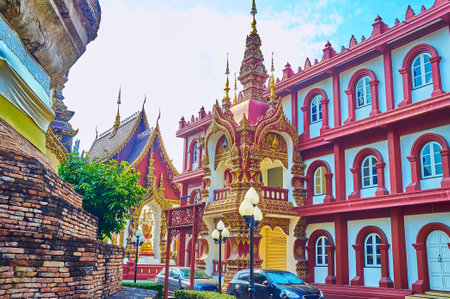 Ho rakang belfry and Kuti building with monks cells in Wat Saen Muang Ma, Chiang Mai, Thailandの写真素材