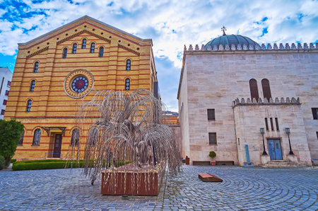 BUDAPEST, HUNGARY - FEB 22, 2022: The weeping willow is the Holocaust Memorial Tree (Emanuel Tree, Tree of Life), located at Dohany Street Synagogue and Heroes Temple, on Feb 22 in Budapestのeditorial素材