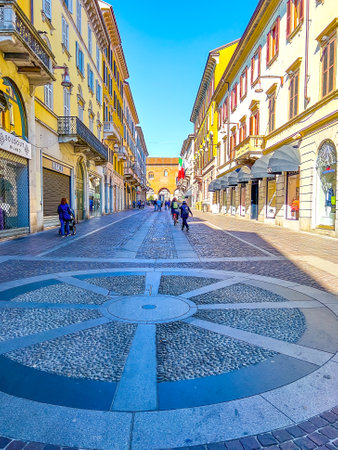 MONZA, ITALY - APRIL 11, 2022: The scenic pavement on pedestrian Via Vittorio Emanuele II street, on April 11 in Monza, Italyのeditorial素材